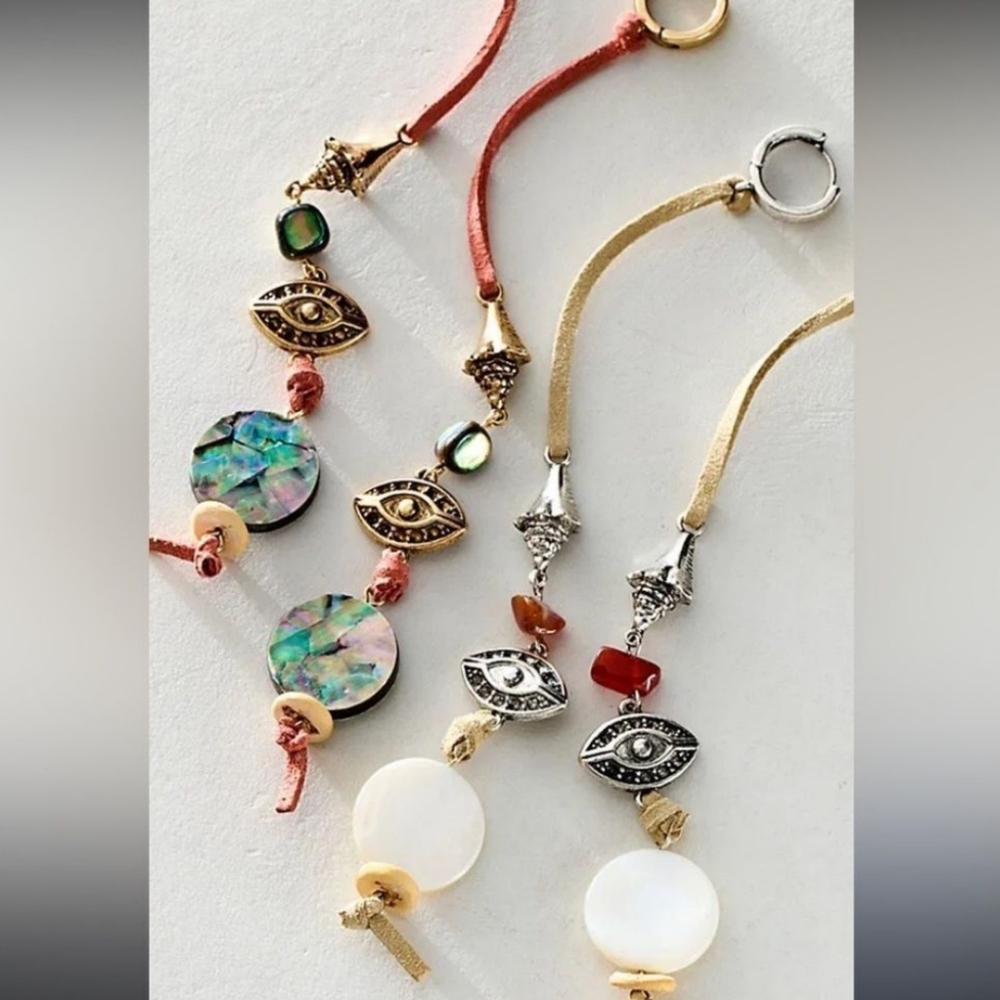 Free People Silver and Orange with leather, shell, and evil eye Dangle Earrings.
